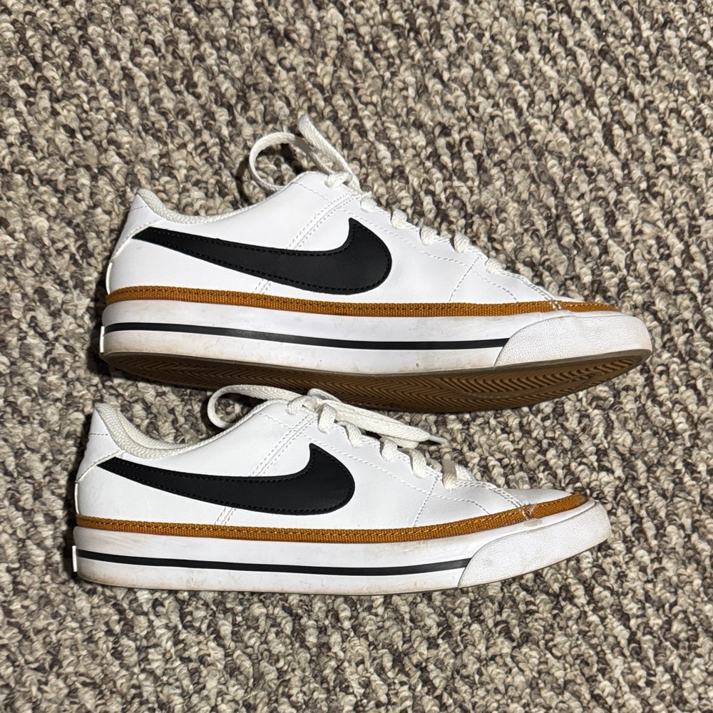 Nike White Sneakers with Black Swoosh and Brown Trim